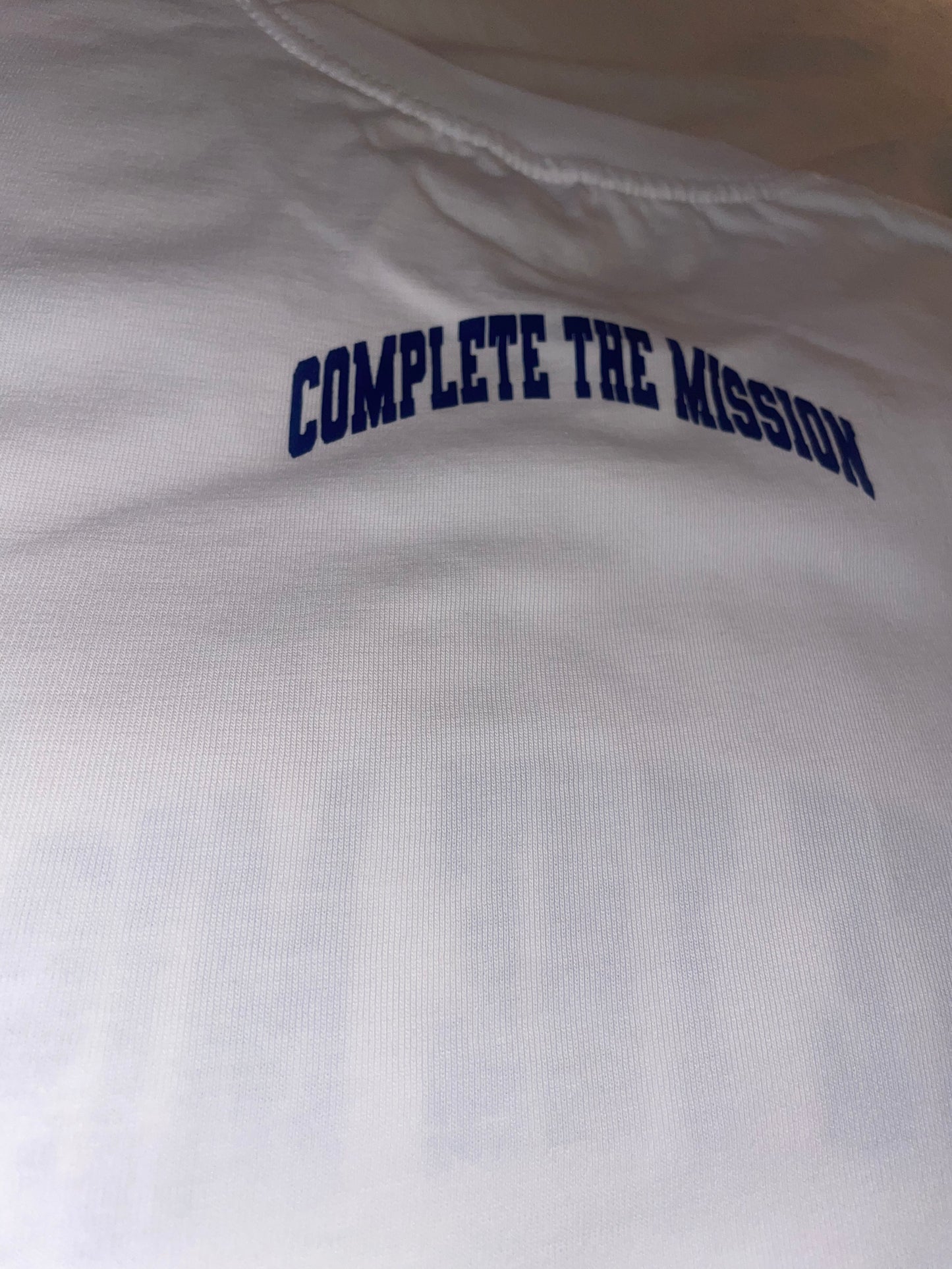 Complete the Mission white T-shirt